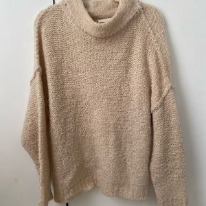 beige low turtle neck sweater